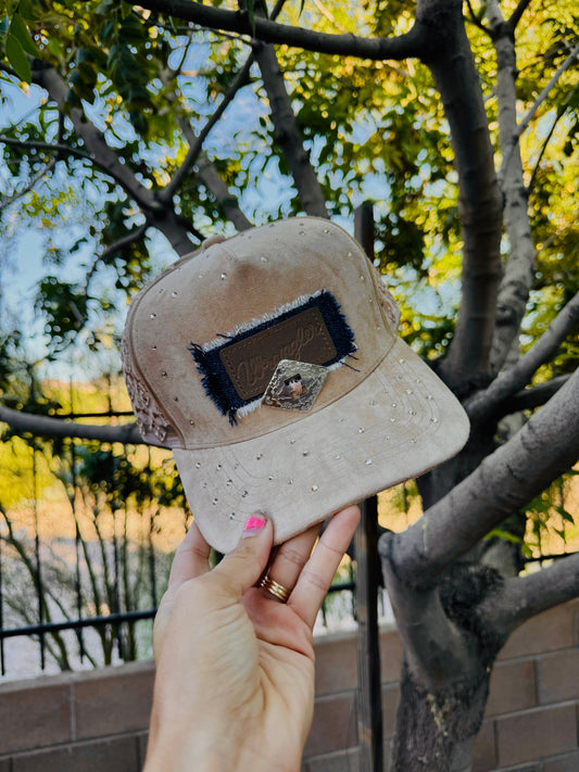 23-REIMAGINED DENIM PATCH WORK TRUCKER -hem label WITH CONCHOS -suede pannel with embroidery mesh back designs and rhinestones details SNAP BACK