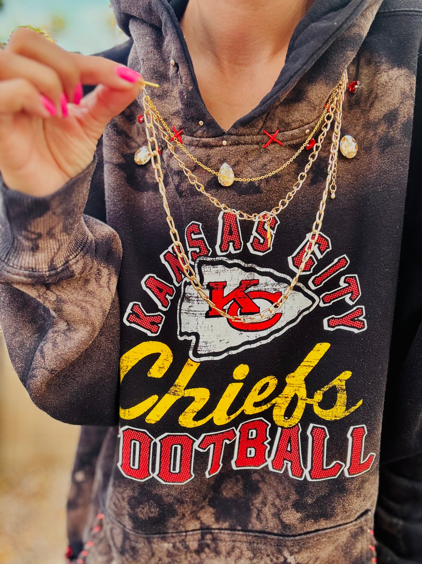 CD- NECKLACE HOODIE RED AND GOLD FOOTBALL BABE  - lace vintage wash+ Men’s unisex size MEDIUM- Cut off bottom band hem