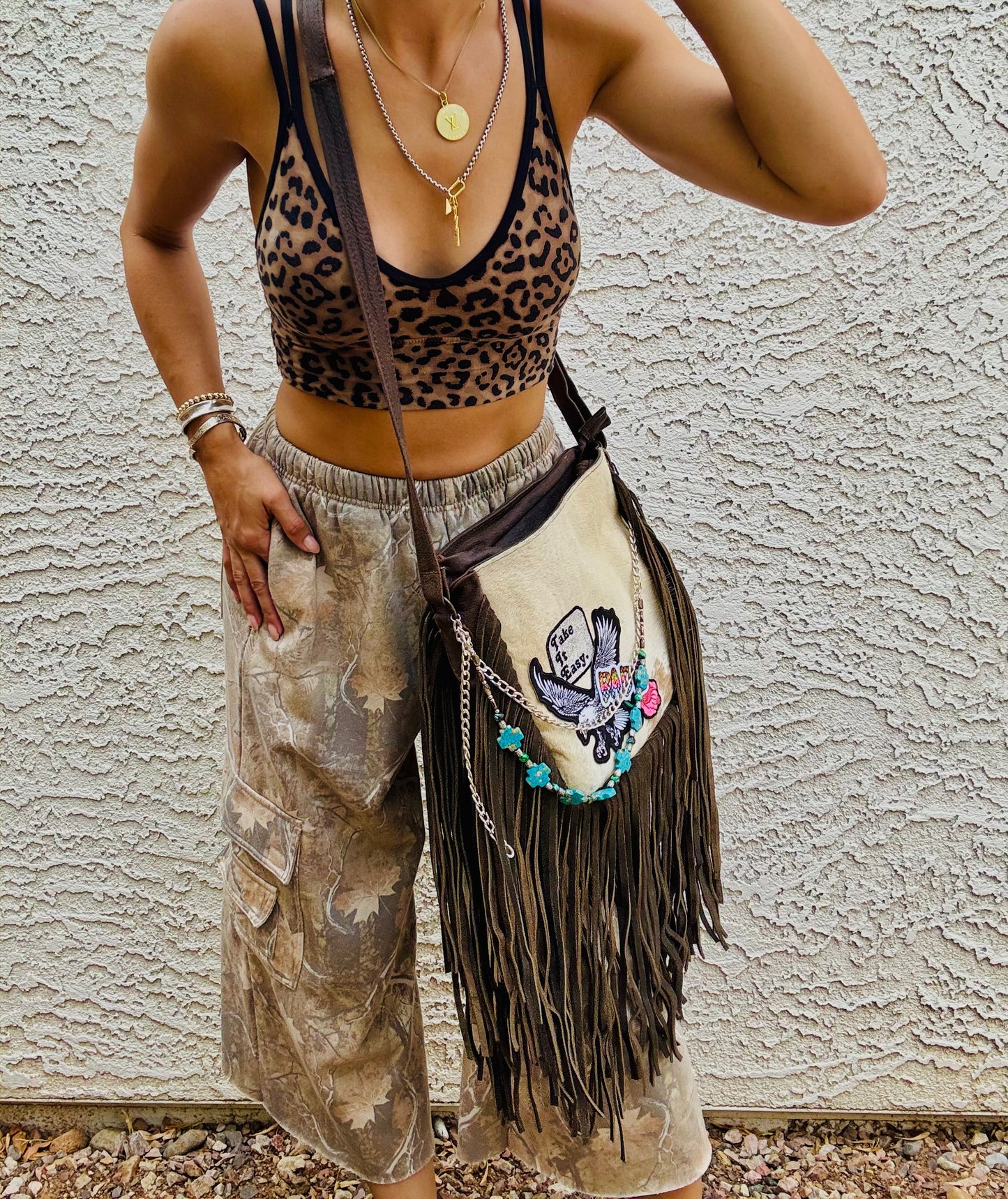 AUGBAG- GENUINE COWHIDE HAIR ON CROSSBODY FRINGE BAG- REAL AUTHENTIC WITH EAGLE TAKE IT EASY VIBES AND HANDBEADED CHAIN WORK.