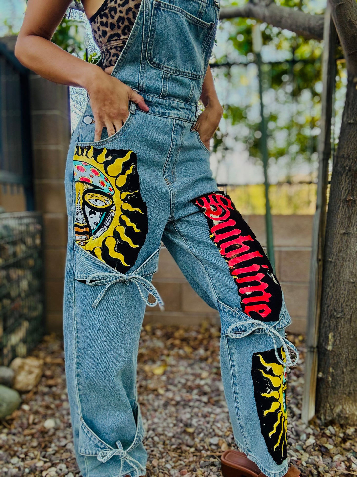 23- retro Sun band babe OVERALLS -Cyder brand (new tags on) tagged XXS by the brand but the run BIG- fits more like a small they are still very baggy on me and I wear size 2-4 jean pants