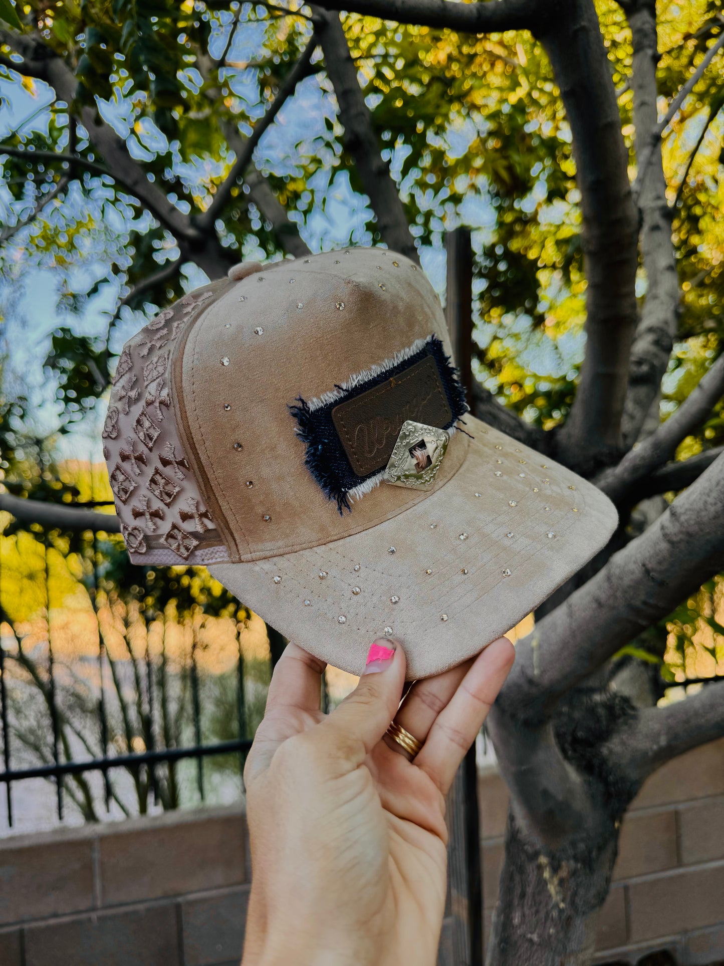23-REIMAGINED DENIM PATCH WORK TRUCKER -hem label WITH CONCHOS -suede pannel with embroidery mesh back designs and rhinestones details SNAP BACK