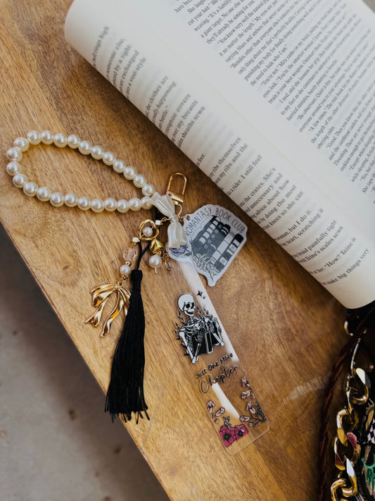 BBC- just one more chapter skeleton with floral ￼+ romantic see book club ￼