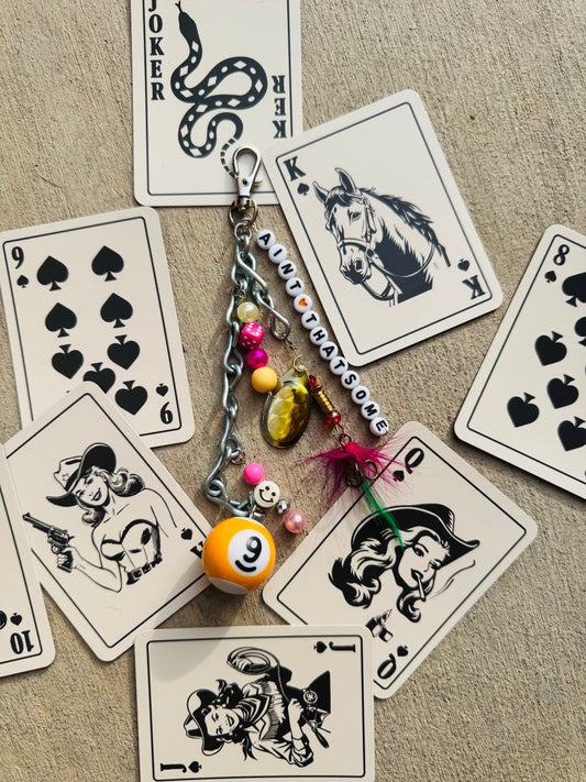 PC-ain’t that some 3 +purse charm candy