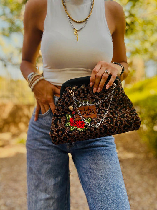 UM-SOMEBODYS PROBLEM LEOPARD BLACK AND BROWN +** LIZZIE KISS CLUTCH￼**